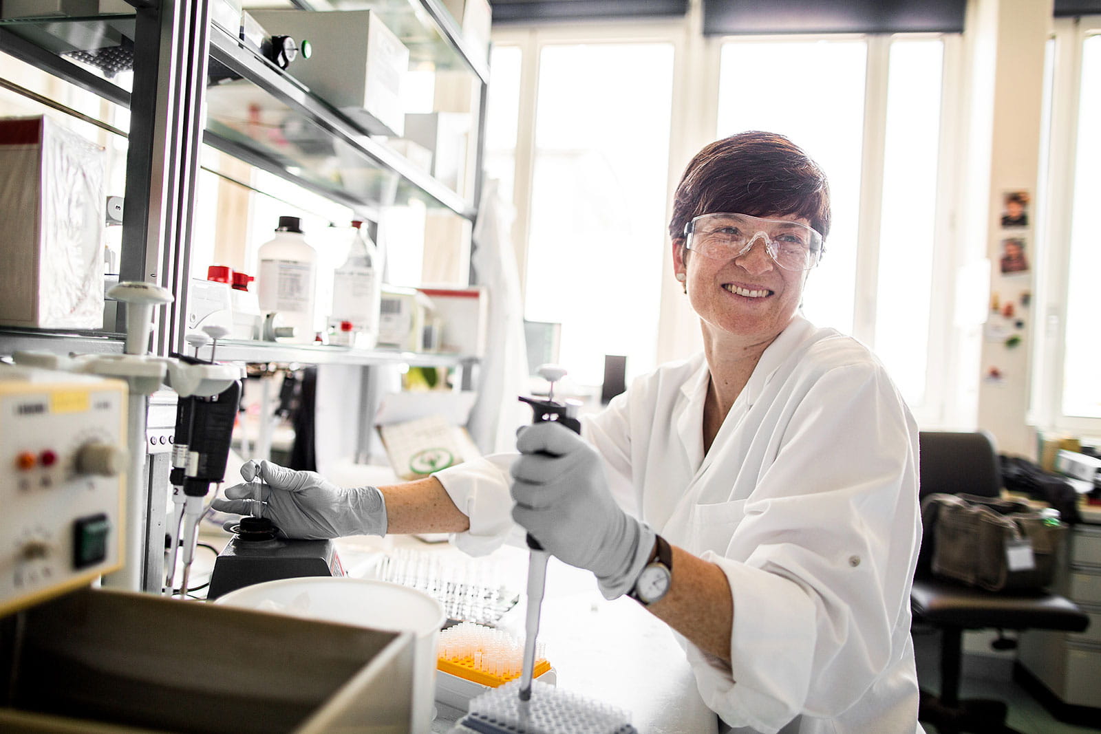 CSL Behring Bern employee Corinne Steiner holding a pipette