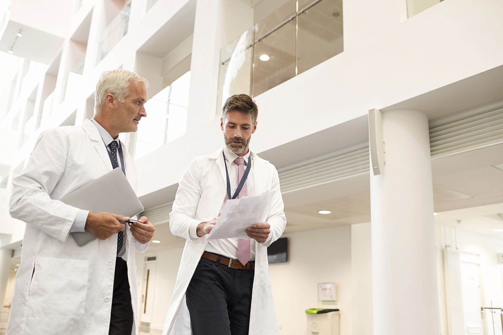 Two doctors walking in a hallway